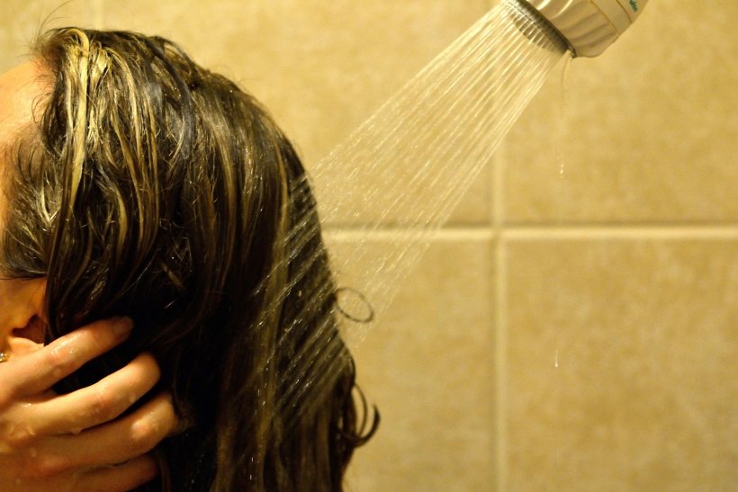 Rinse your hair with apple cider vinegar 1 2